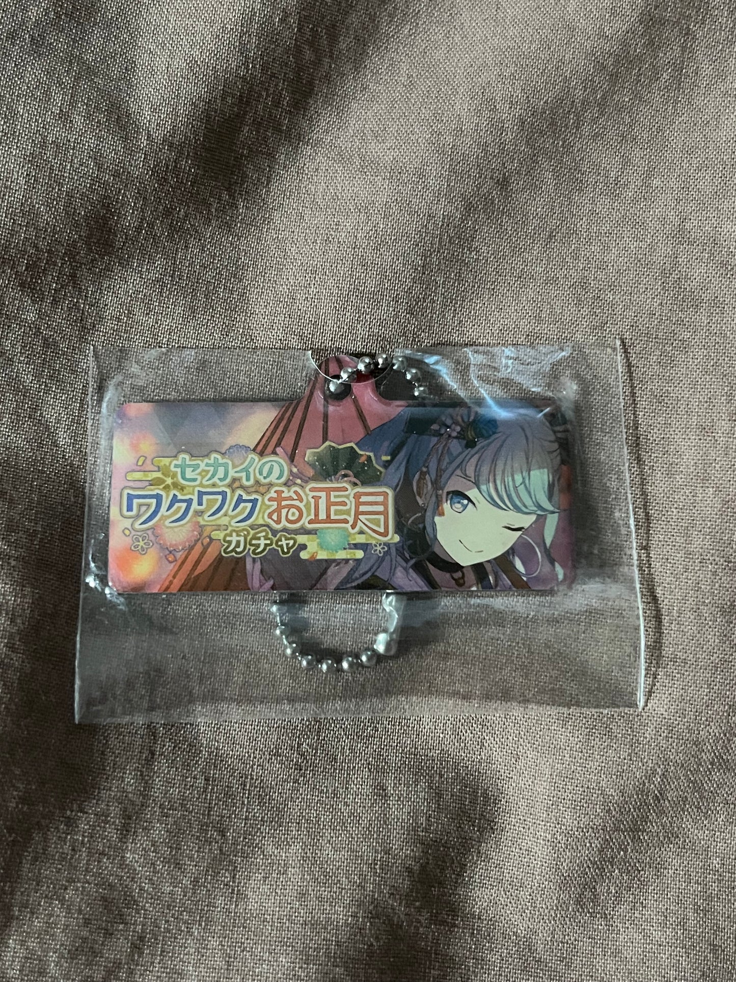 Project Sekai - Hatsune Miku “SEKAI's Happy New Year!” Metal Event Keychain [TRAINED]