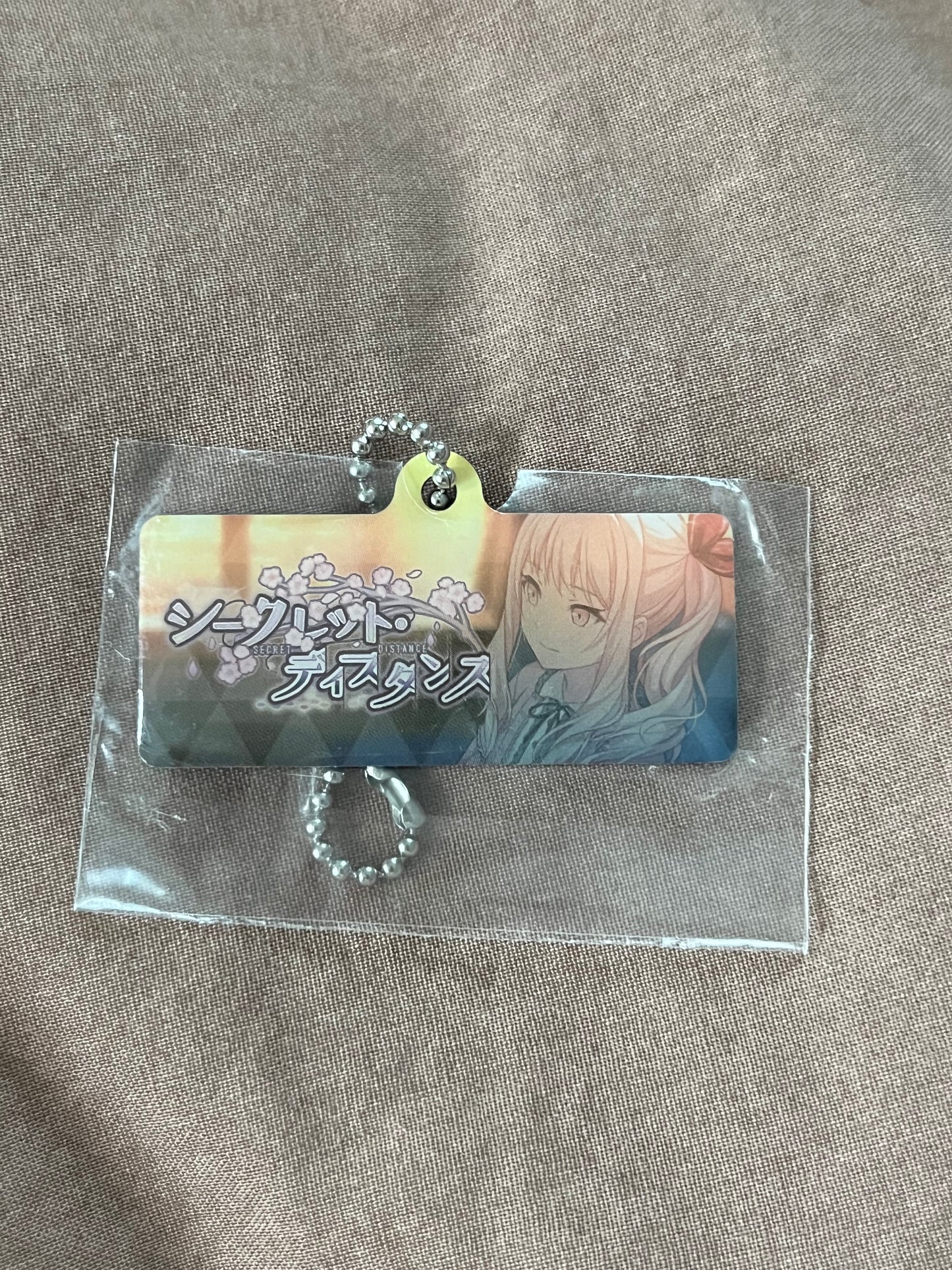 Project Sekai - Mizuki Akiyama “Secret Distance" Metal Event Keychain [UNTRAINED]