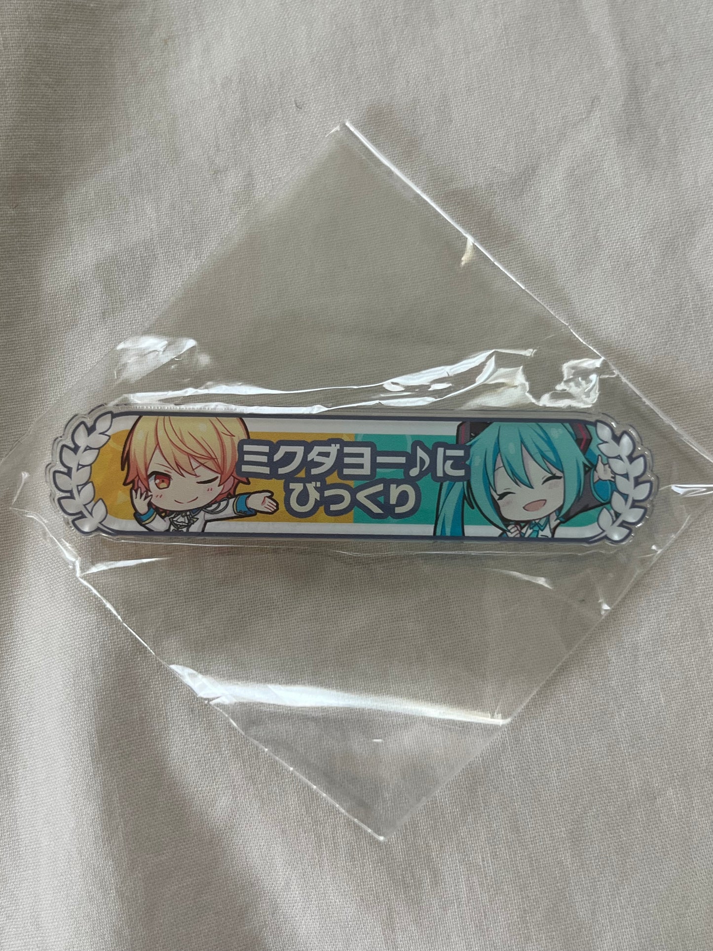 Tsukasa Tenma & Hatsune Miku “Scared by Mikudayo”  Kizuna Rank Acrylic Badge
