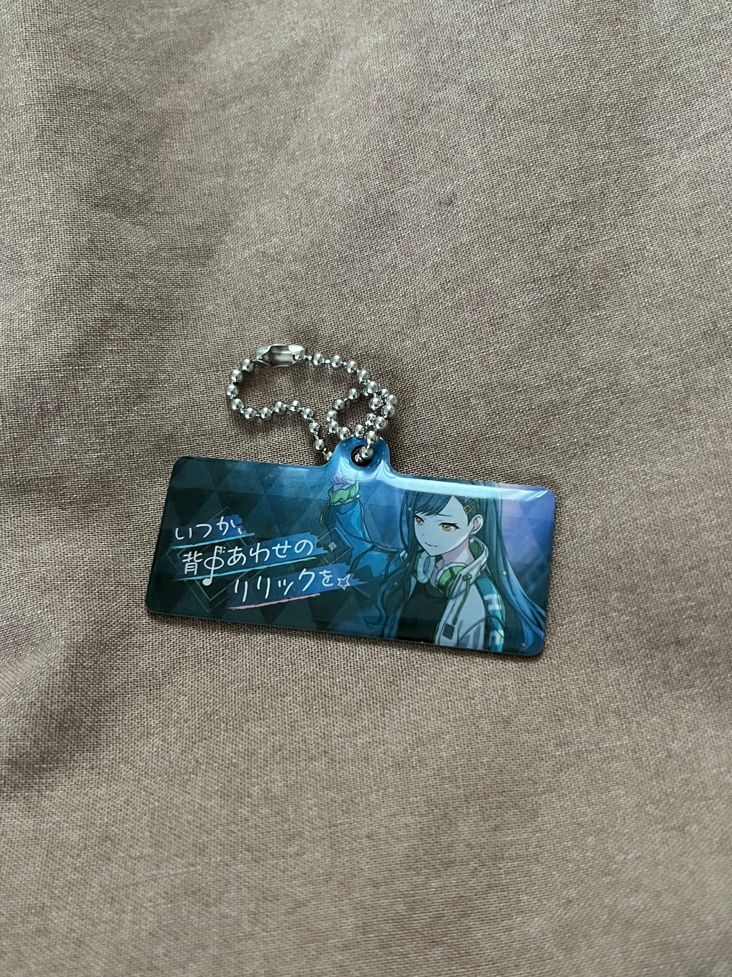 Project Sekai - An Shiraishi "Singing in Sync" Metal Event Keychain [UNTRAINED]