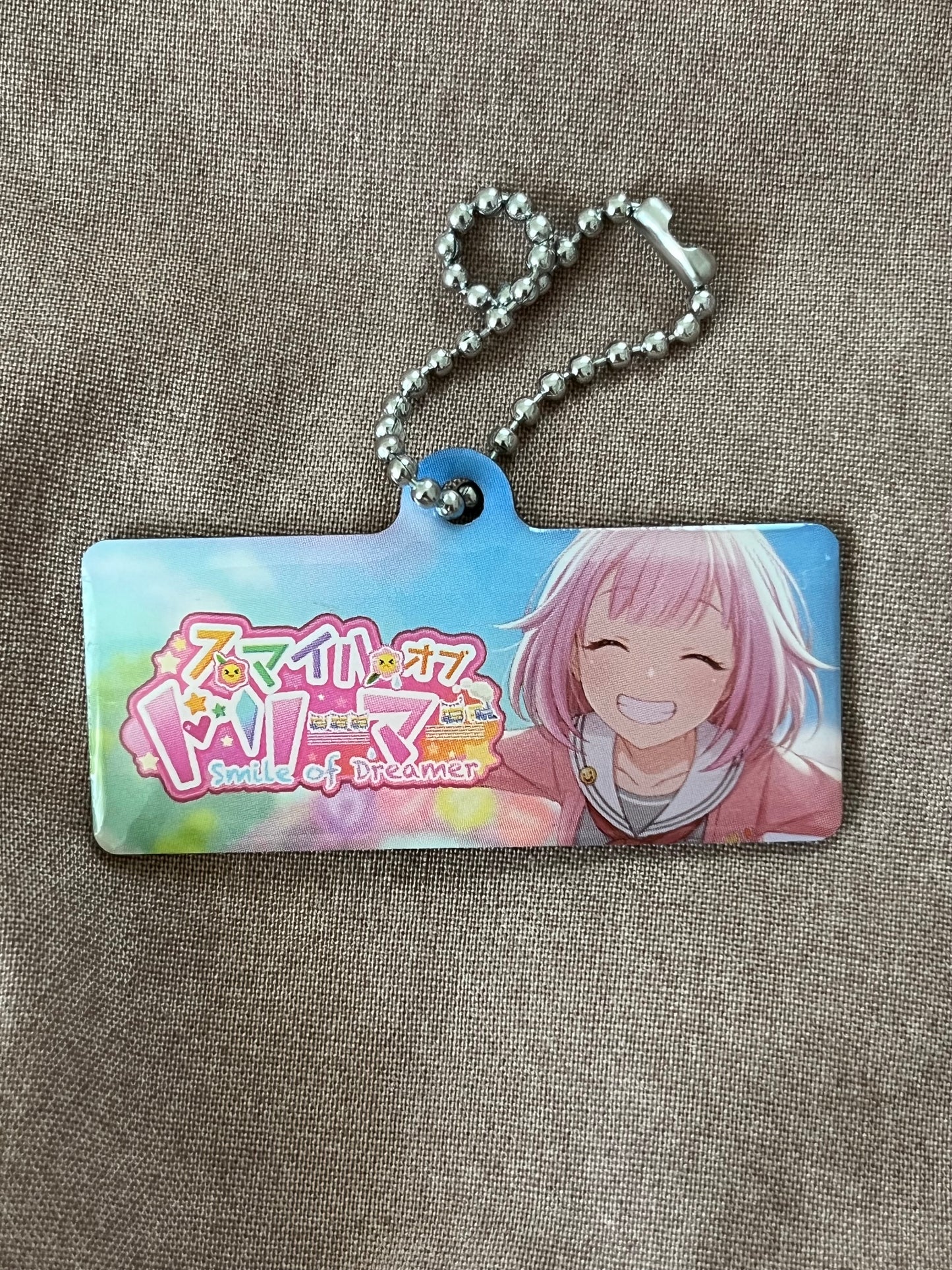 Project Sekai - Emu Otori "Smile of Dreamer" Metal Event Keychain [UNTRAINED]